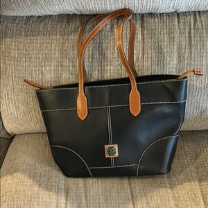 Dooney and Bourke Wexford All leather tote Apx 14 by12 black with brown trim